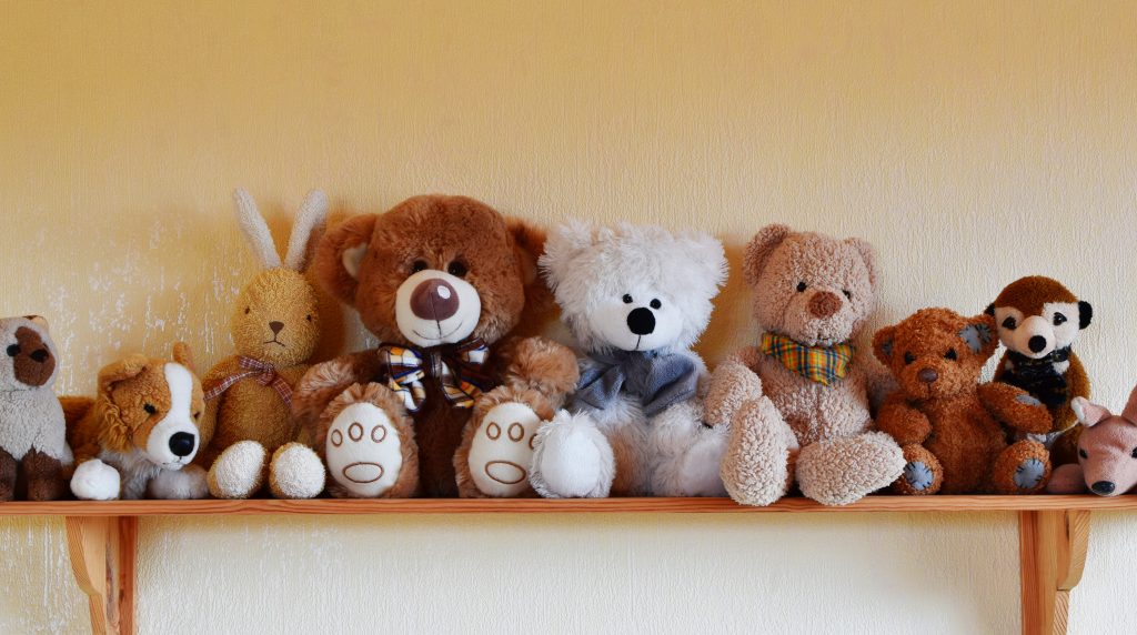 The shelf of stuffed animals