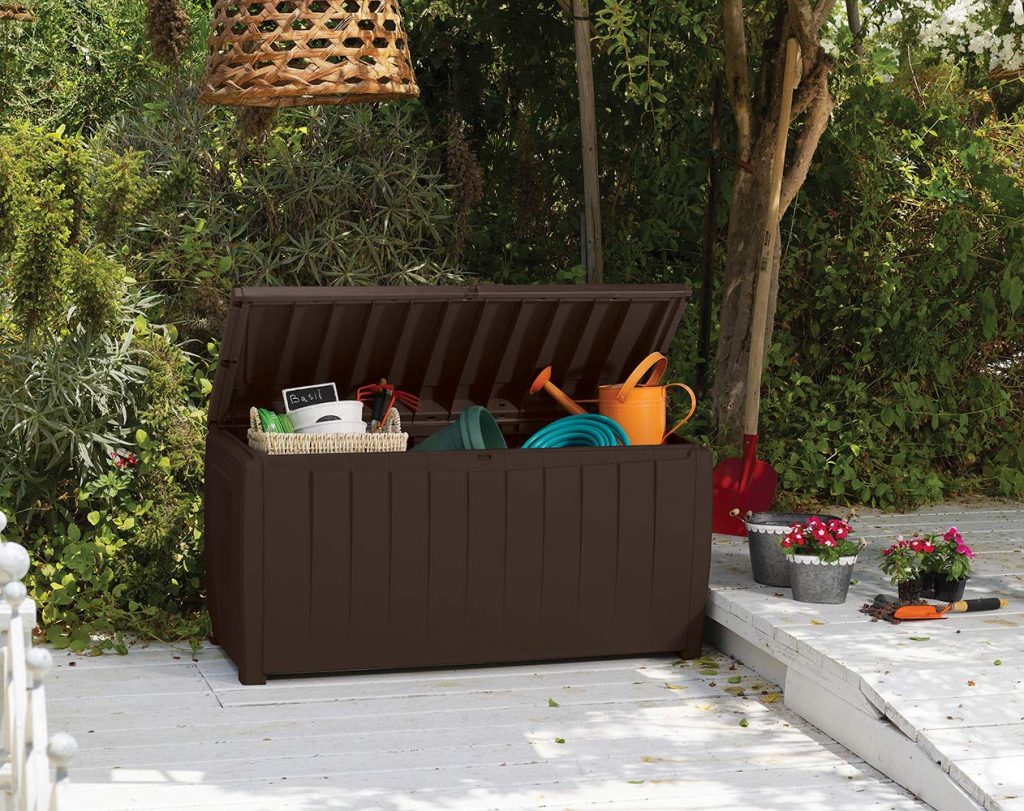 Large dark brown outdoor storage box set in garden