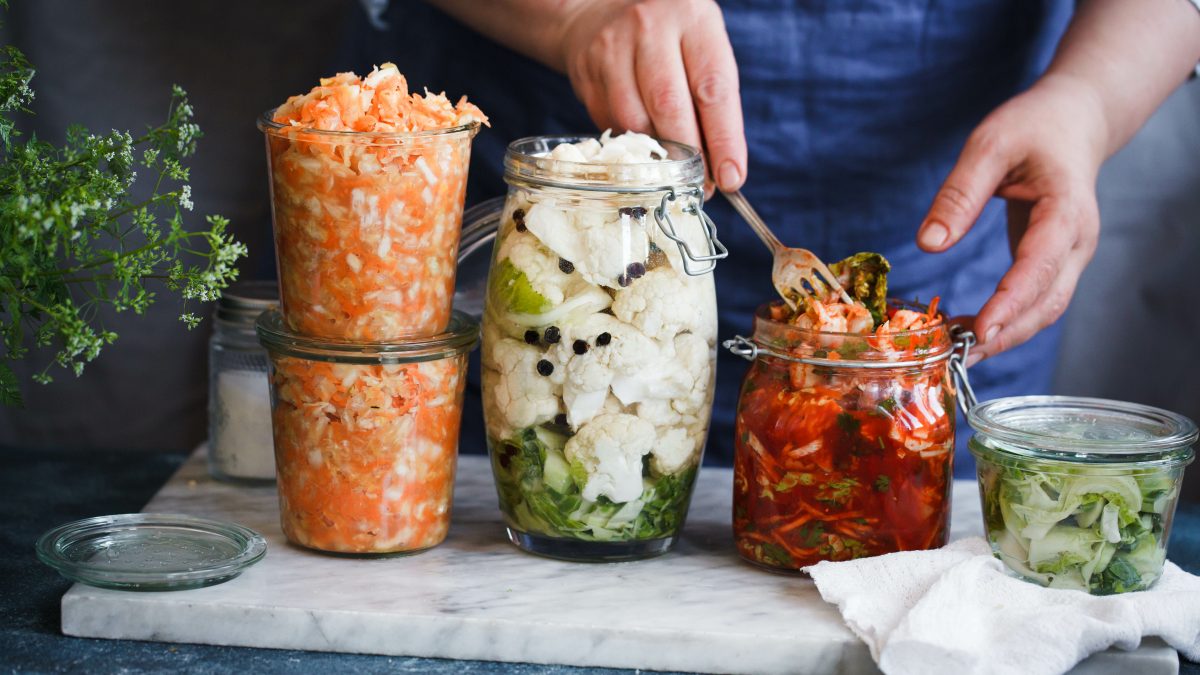 https://storables.com/wp-content/uploads/2020/03/Fermented-preserved-vegetarian-food-concept.-Cabbage-kimchi-broccoli-marinated-sauerkraut-sour-glass-jars-1200x675.jpeg