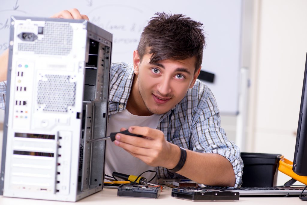 Young man checking a CPU