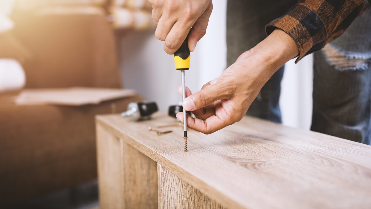 https://storables.com/wp-content/uploads/2020/05/man-assembling-a-shelf-1200x675.jpeg