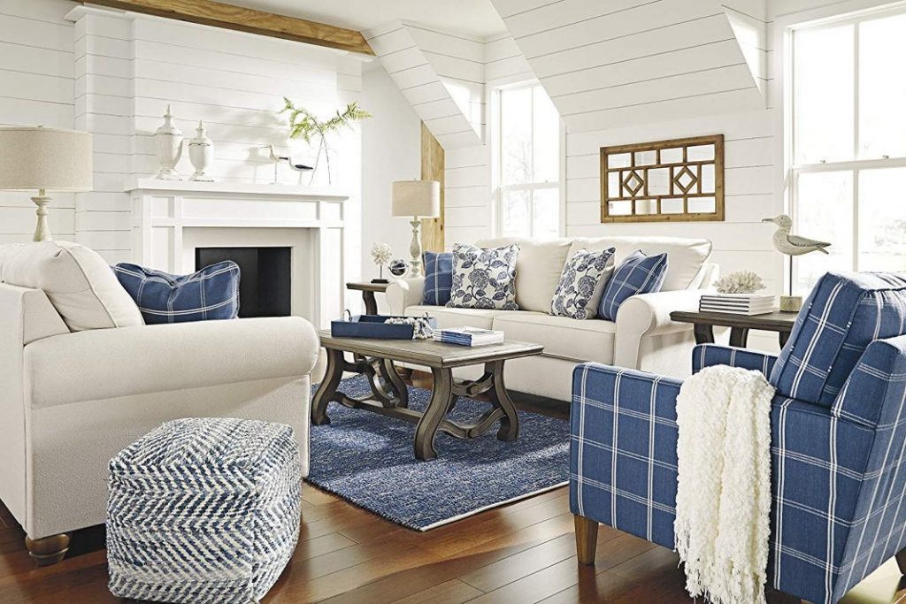 living room with plaid rugs