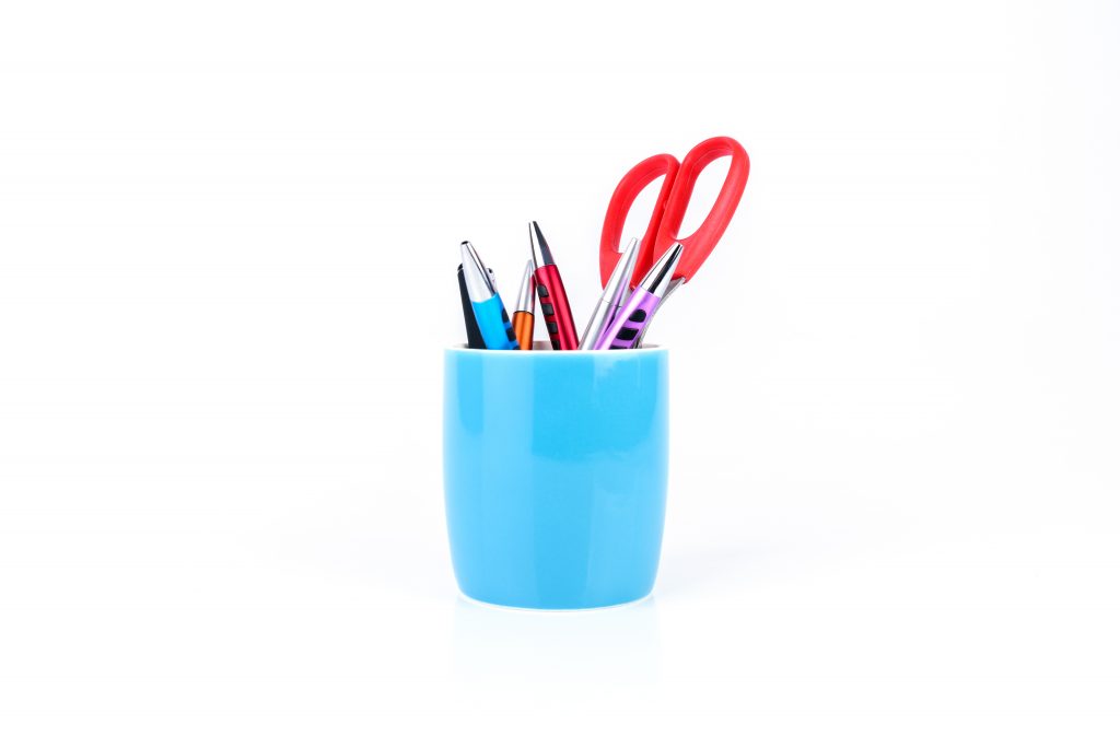 Color pens in a cup