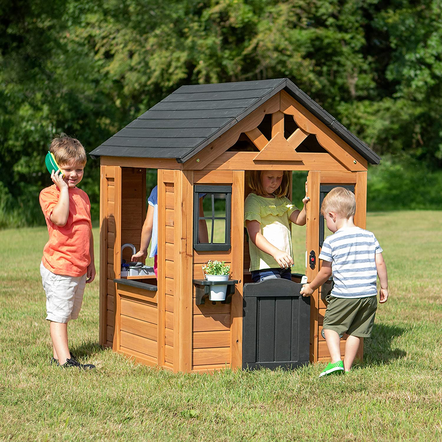 2. Backyard Discovery’s Sweetwater Wooden Playhouse 
