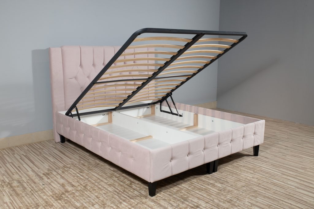  bed with a storage space revealed by lifting the wooden slatted base