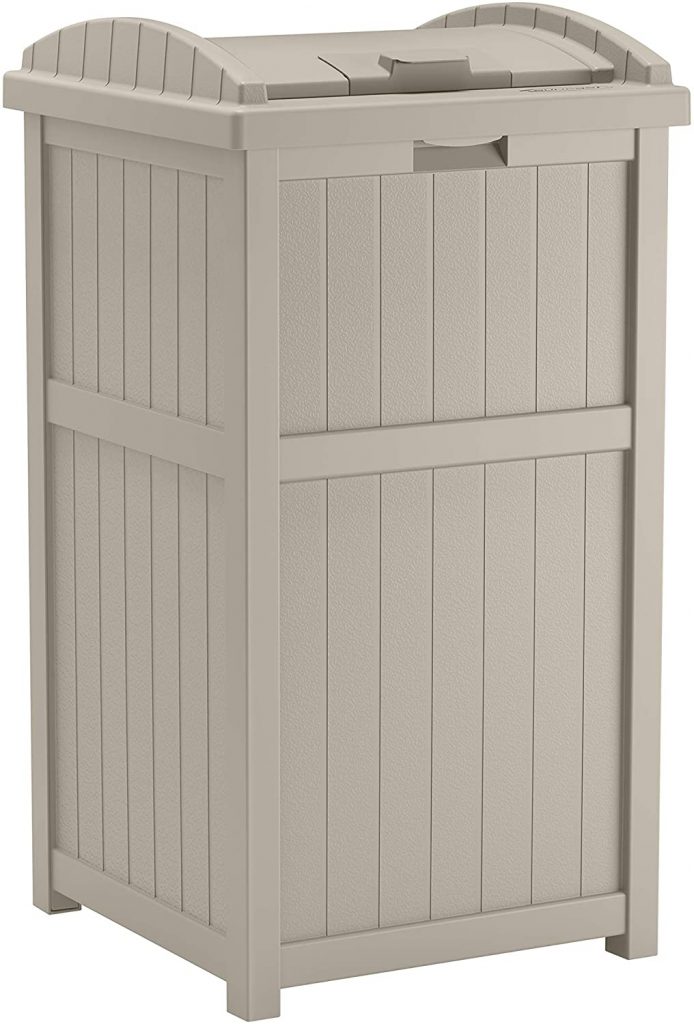 A large outdoor garbage can in light beige