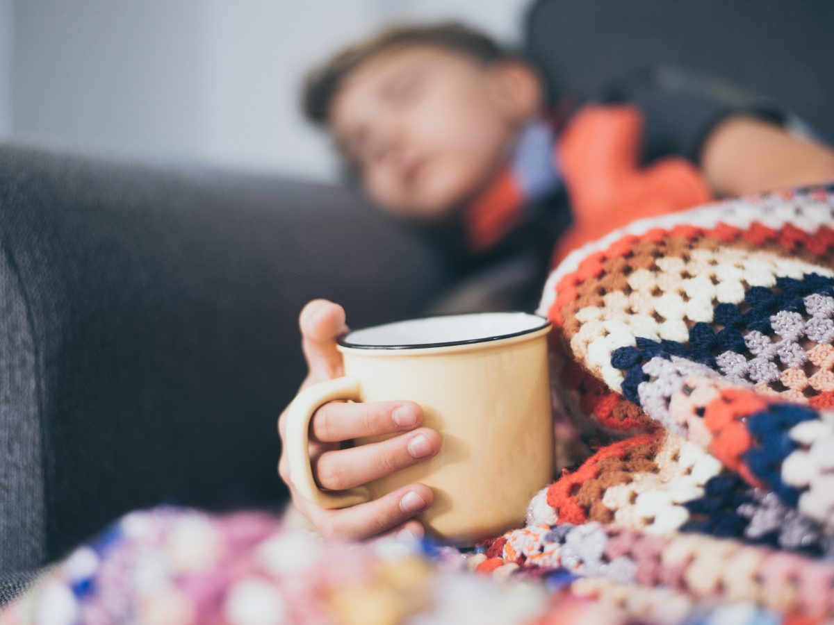 https://storables.com/wp-content/uploads/2021/01/Sick-boy-sleeping-with-woolen-blanket-hot-water-bottle-and-a-mug.-Sad-teen-with-the-flu-rests-alone-at-home-in-a-cold-winter-day-1200x900.jpeg