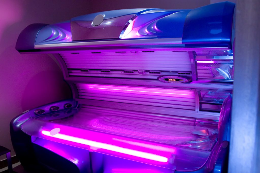 Tanning bed with purple glow