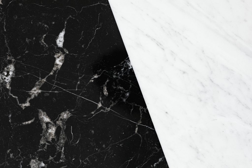 Black smooth marble texture with white streaks
