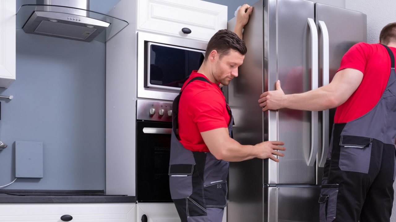 moving a fridge freezer to clean behind