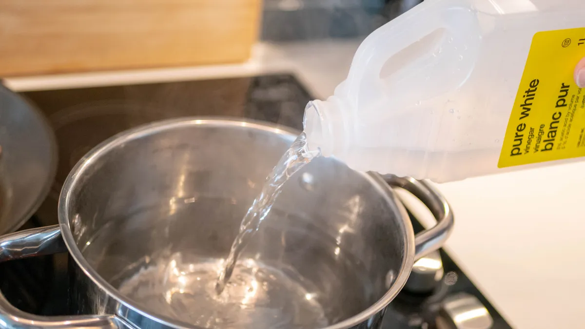Why You Should Keep A Bowl Of Vinegar Next To Your Stove