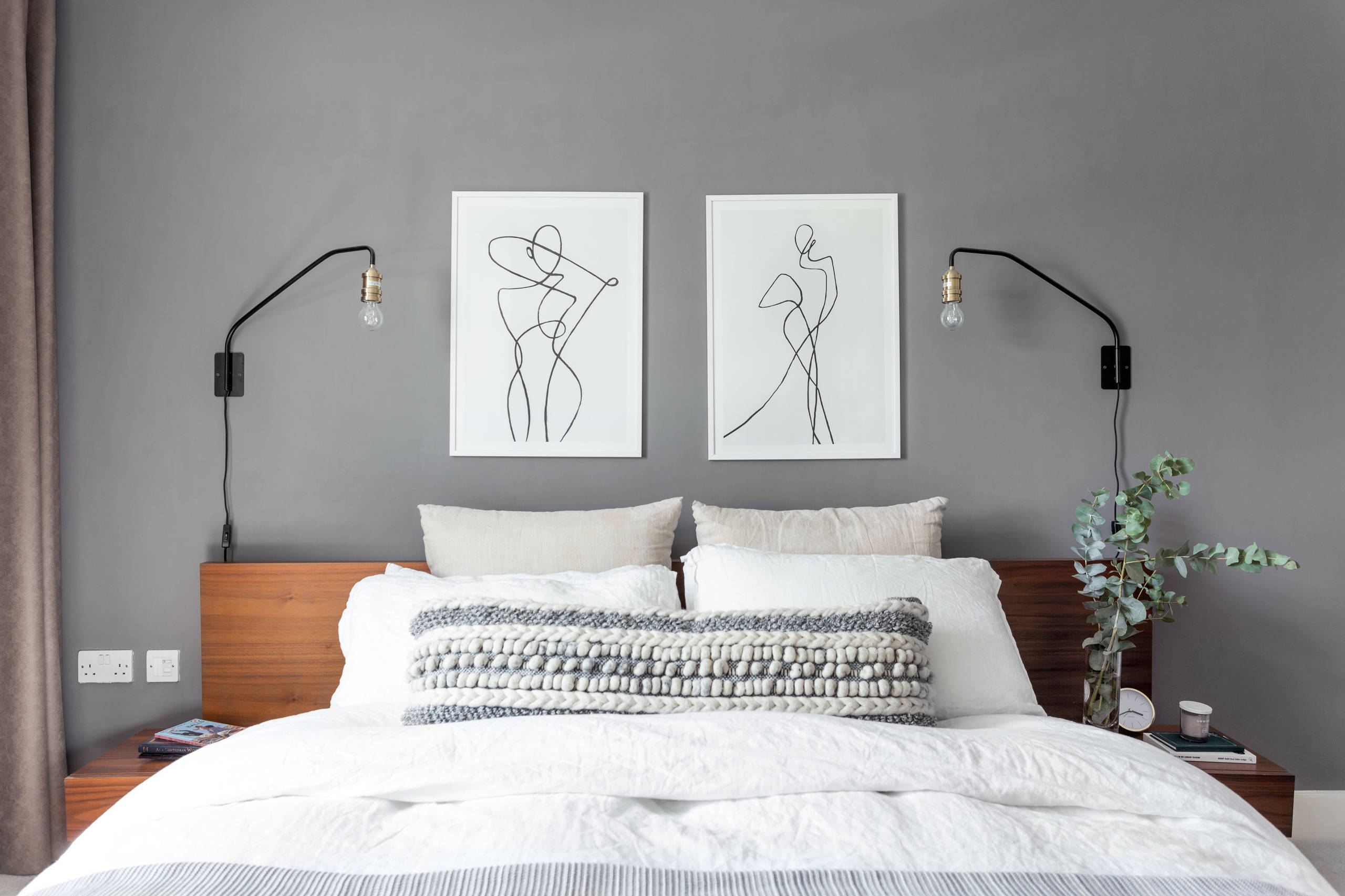 Why You Should Never Hang Art Vertically In The Bedroom