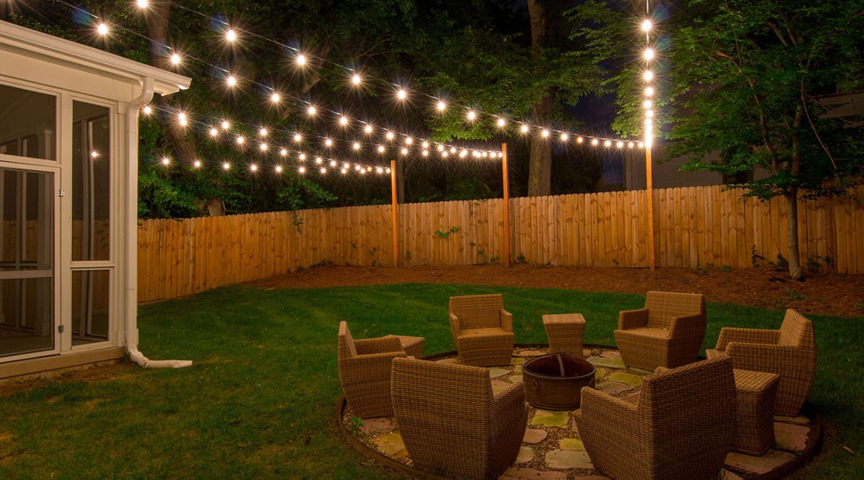 How To Hang Outdoor String Lights On Your Patio Or Deck