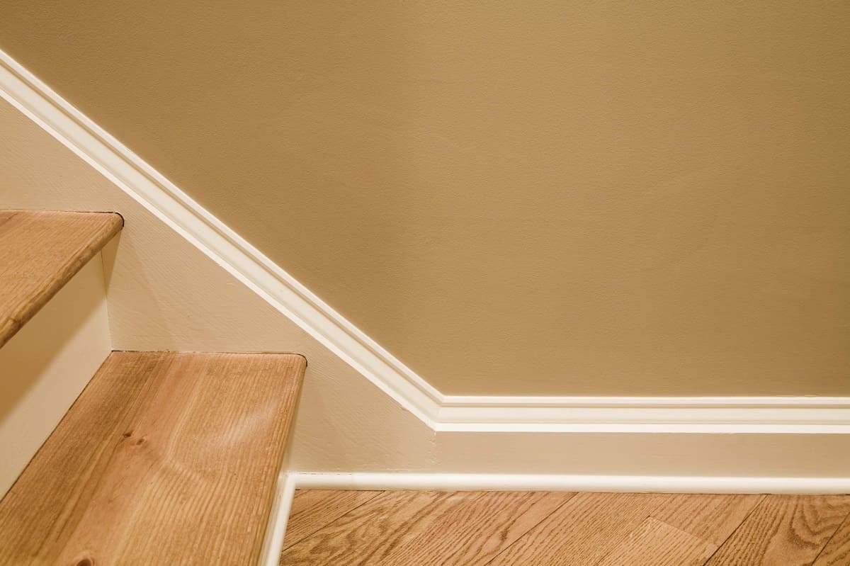 How To Put Baseboard On Stairs