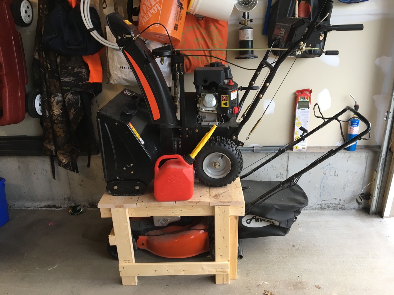How To Store Lawn Mower And Snow Blower In Garage