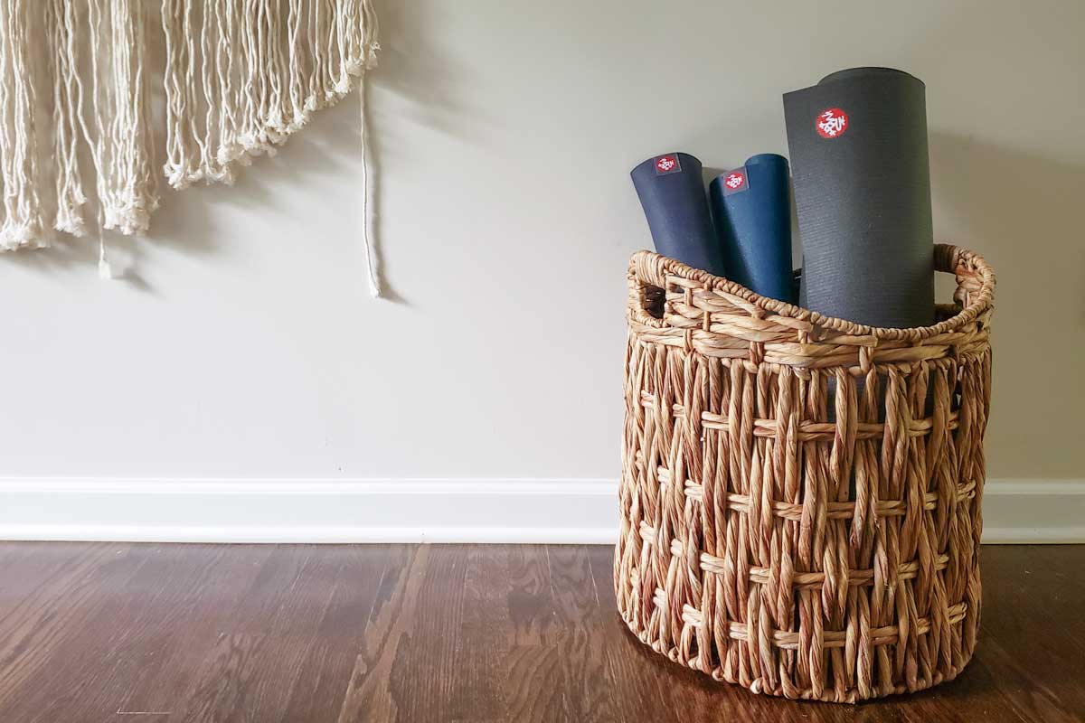 11 Ways To Store Your Yoga Mats  Black basket, Basket sets, Yoga mat  storage basket