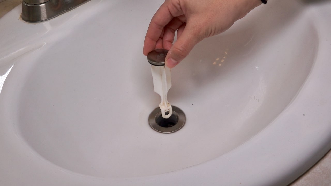 How To Take Out A Sink Stopper