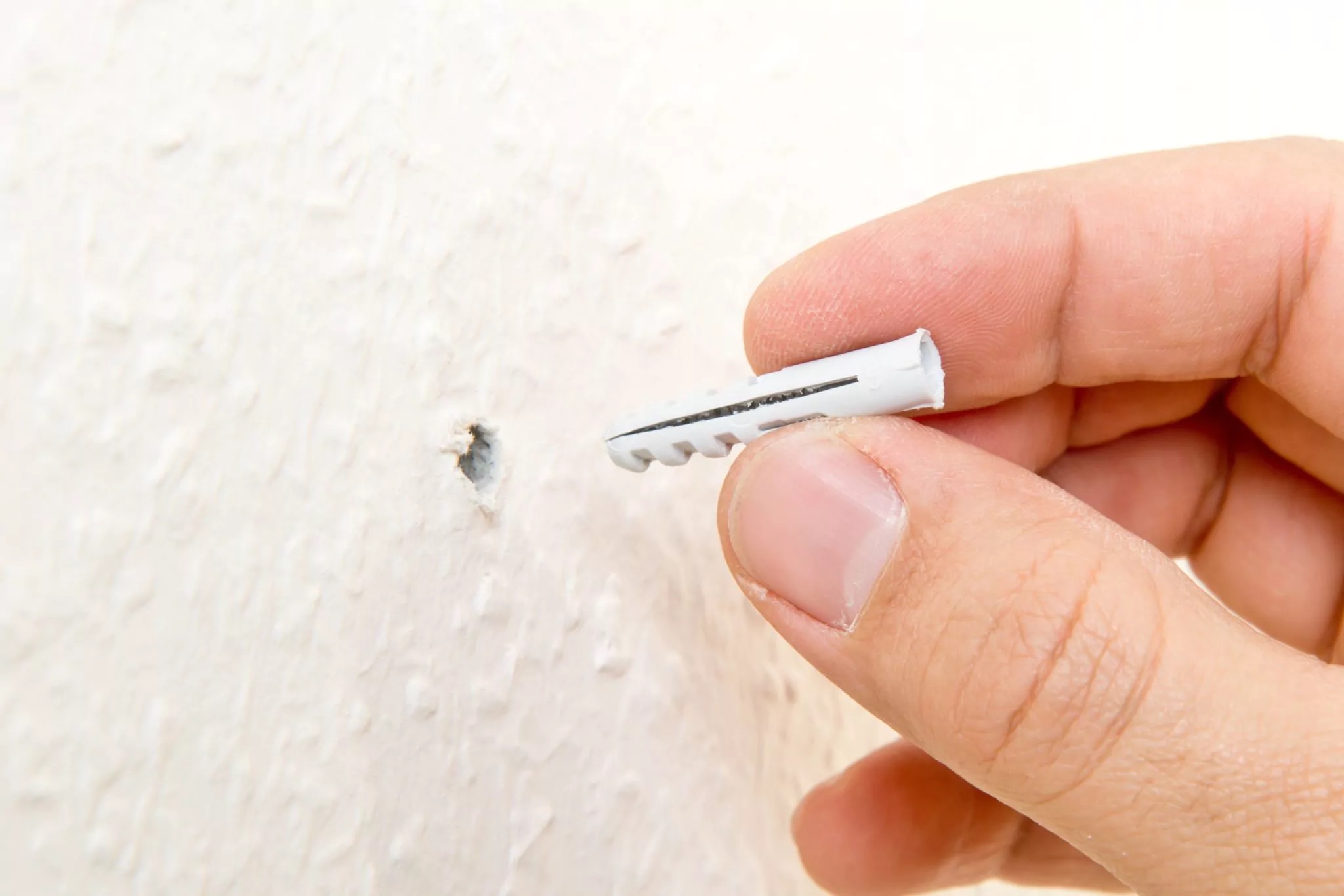 How To Use Drywall Anchors To Hang Your Favorite Decor