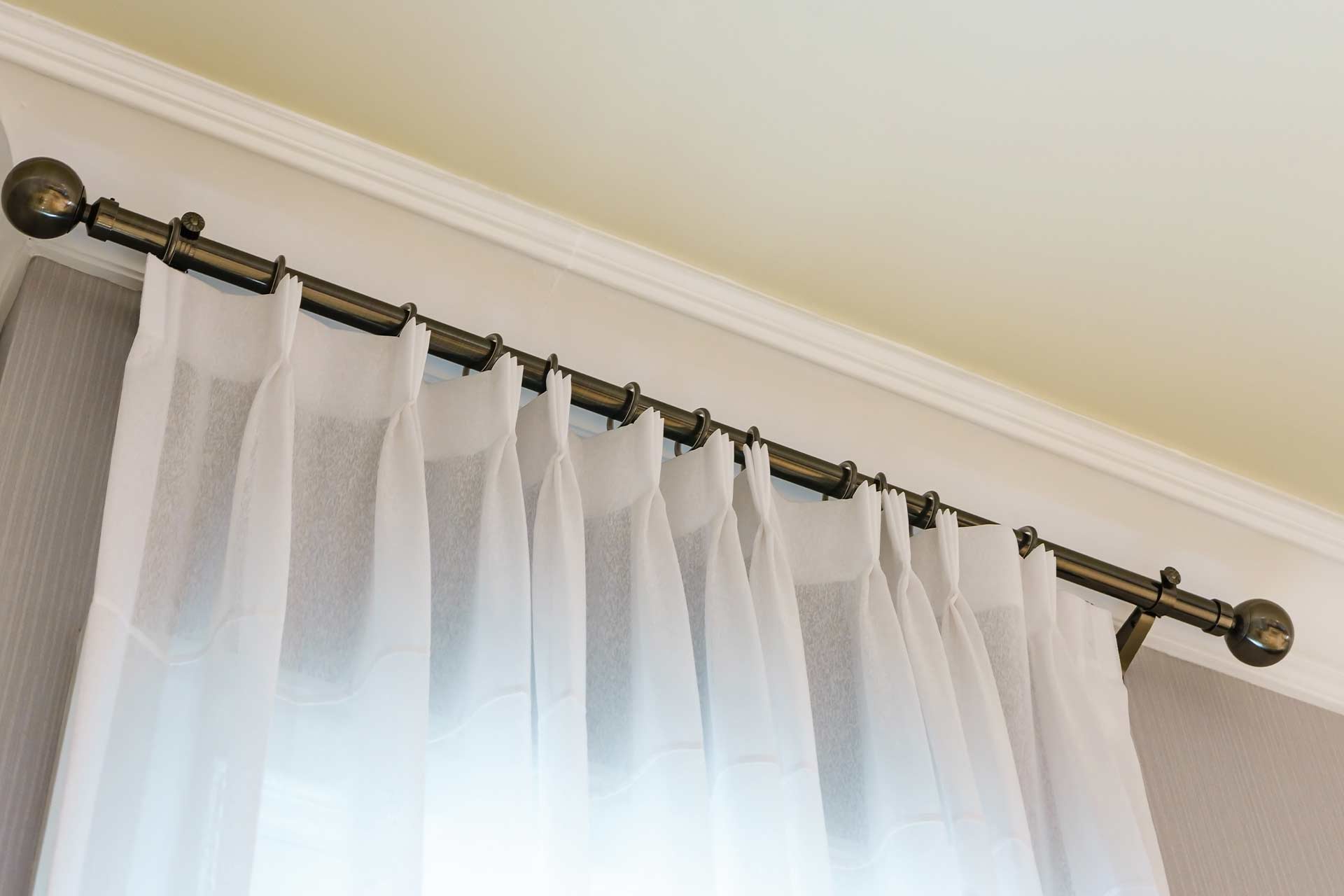 How to Hang Grommet Curtains