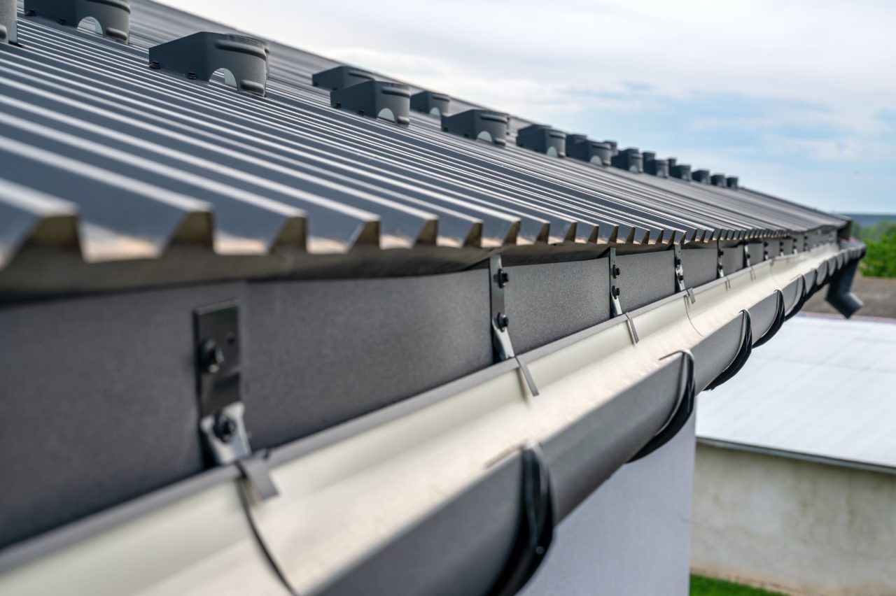 How Much Overhang On Metal Roof For Gutters