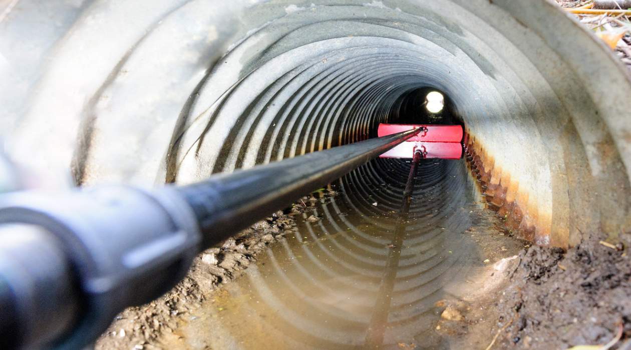 How To Clean Out Drainage Pipe Under Driveway