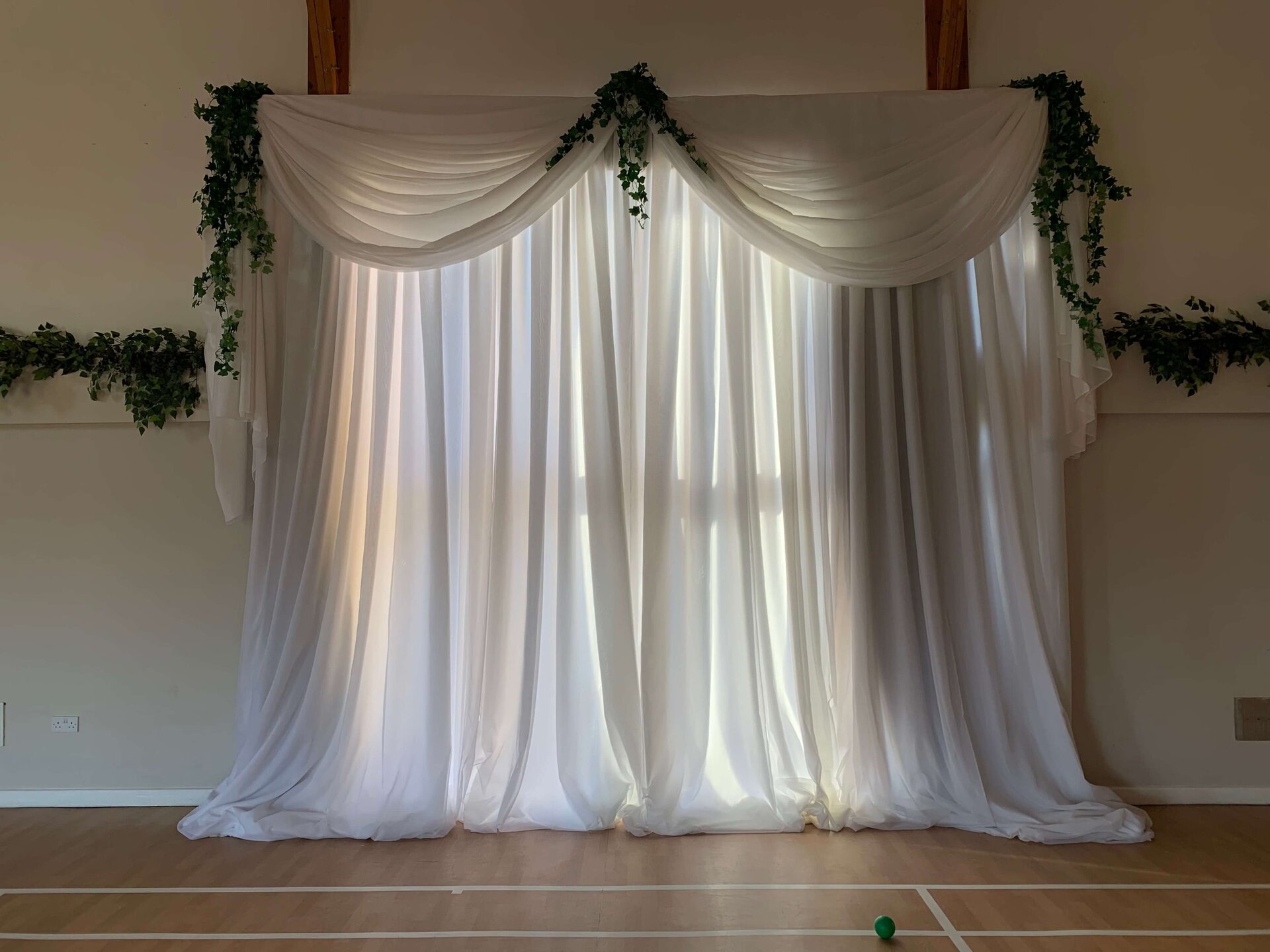How To Drape Curtains For Backdrop