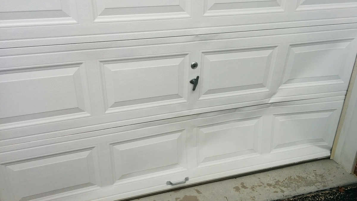 How To Fix A Bent Garage Door