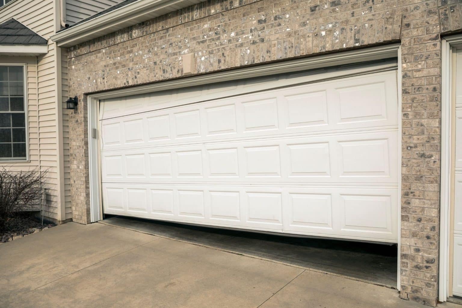 How To Fix Crooked Garage Door
