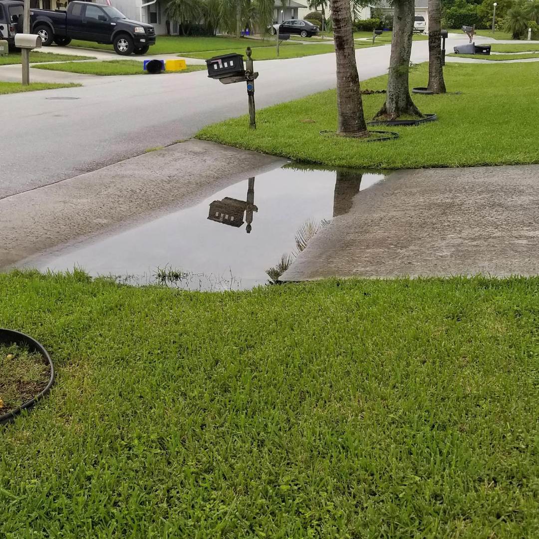How To Fix Water Pooling In Driveway