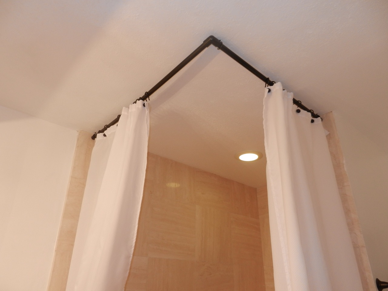 Using a Ceiling Curtain Track to Hang a Shower Curtain