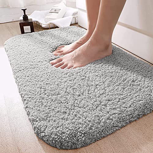 https://storables.com/wp-content/uploads/2023/11/dexi-bathroom-rug-mat-extra-soft-and-absorbent-bath-rugs-washable-non-slip-carpet-mat-for-bathroom-floor-tub-shower-room-24x16-grey-61qAKydOjyL.jpg