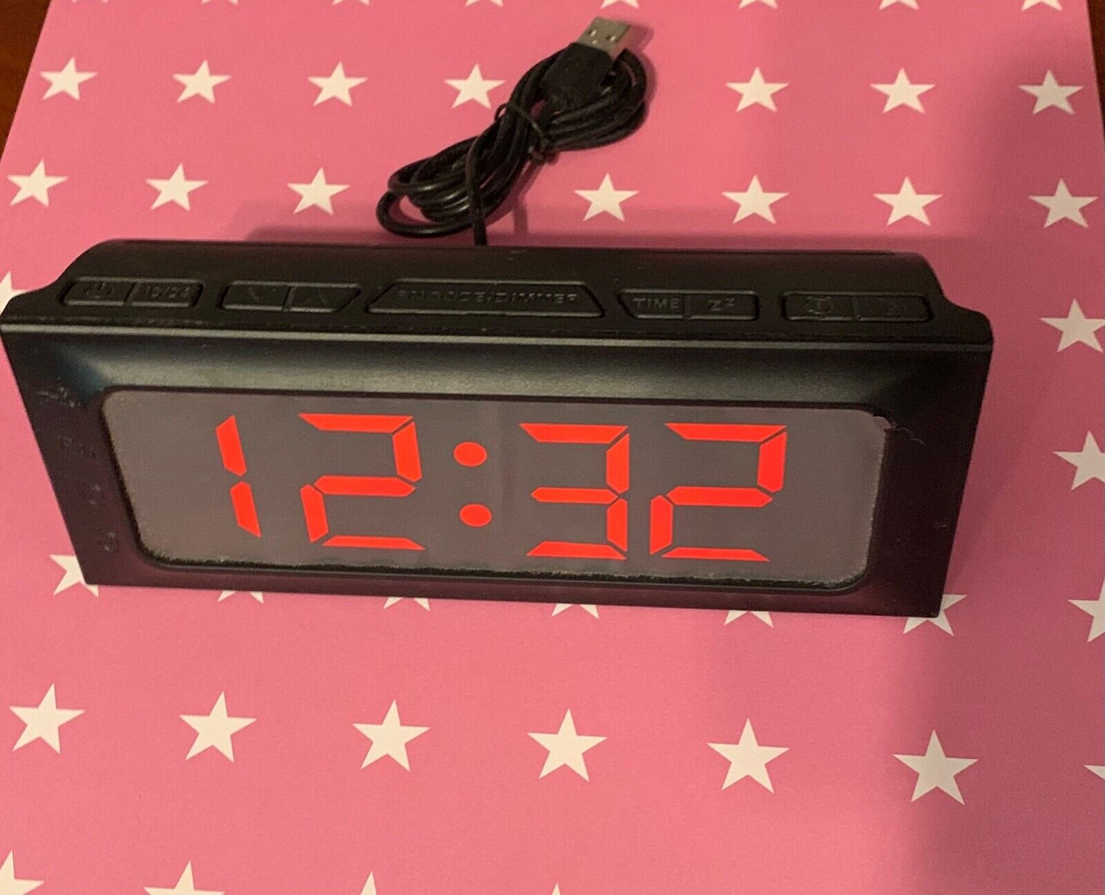 to set the alarm clock