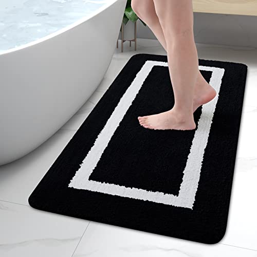 https://storables.com/wp-content/uploads/2023/11/kitinjoy-luxury-bathroom-rug-mat-super-soft-water-absorbent-microfiber-bath-rug-non-slip-plush-shaggy-bath-carpet-machine-wash-dry-bath-mats-for-bathroom-floor-tub-and-shower-24-x-47-black-41YbsW3Ns1L.jpg