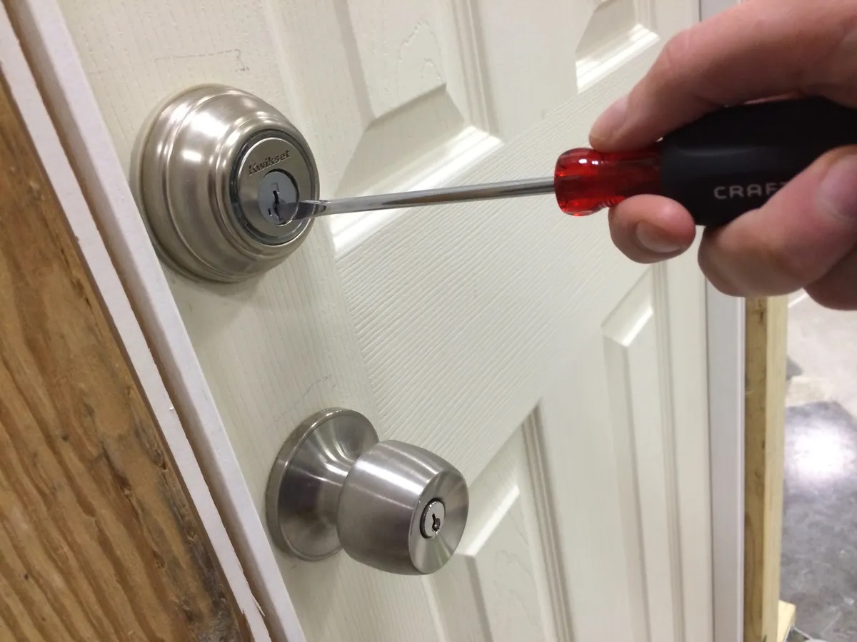 How To Break A Door Lock With A Screwdriver