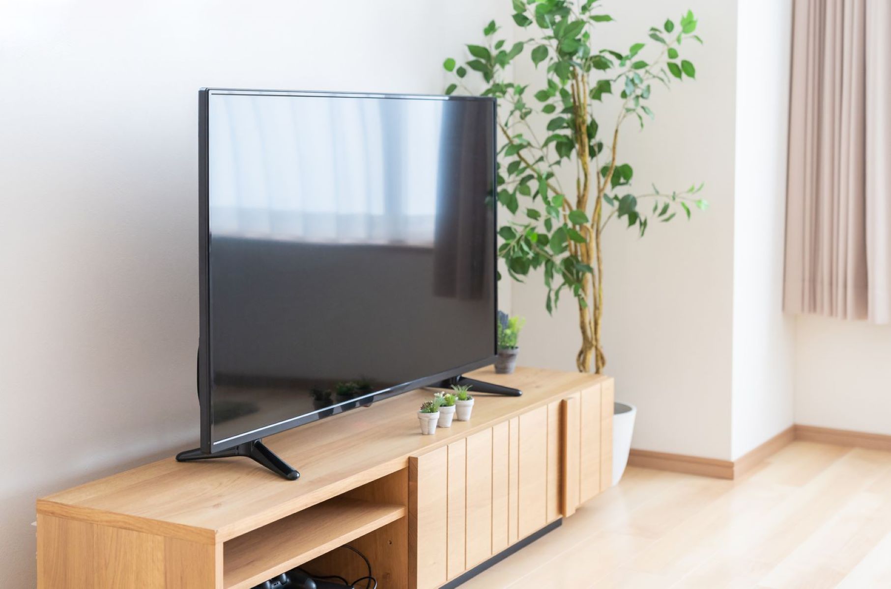 How To Decorate Around A TV Stand In The Living Room