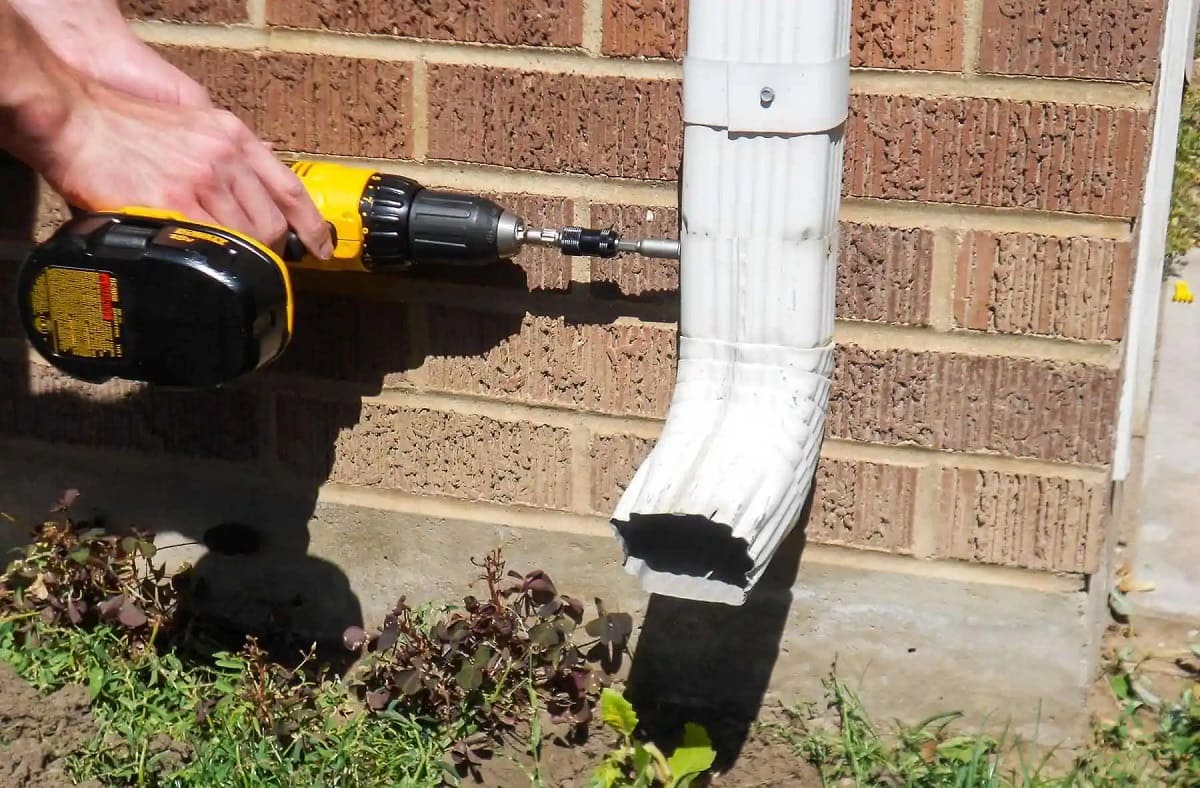 How To Attach A Downspout To A Brick House