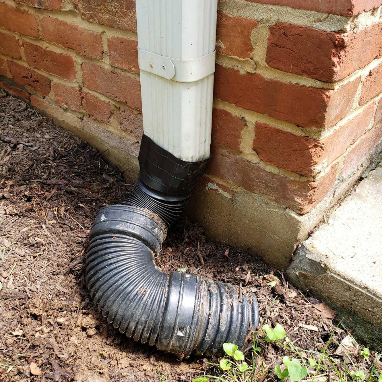 How To Attach Downspout To Brick