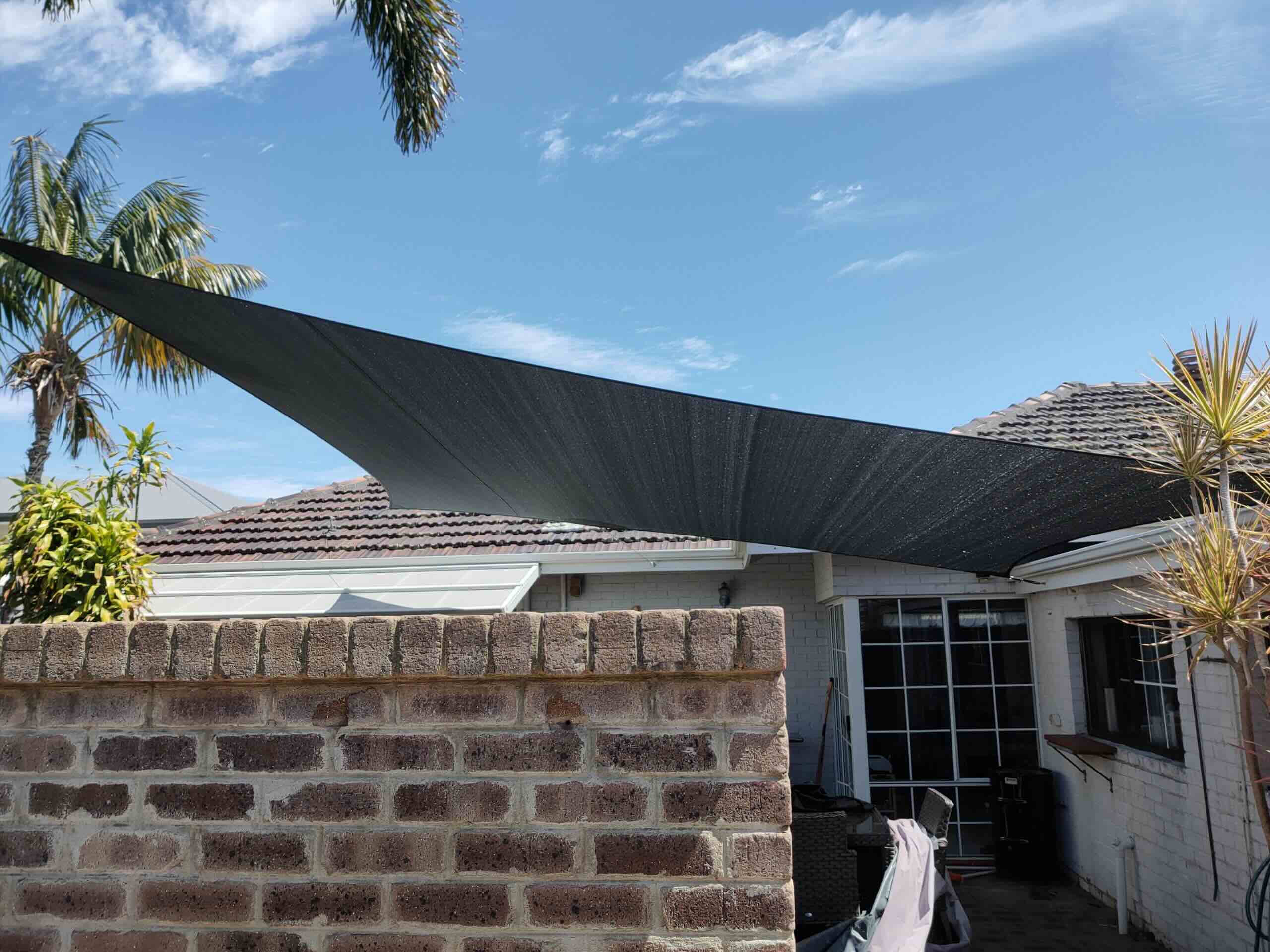 How To Attach Sun Shade To Brick Wall