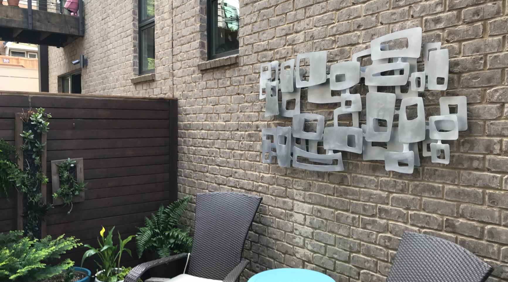How To Decorate Brick Wall Outside