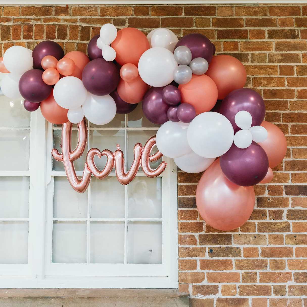 How To Hang A Balloon Arch On A Brick Wall