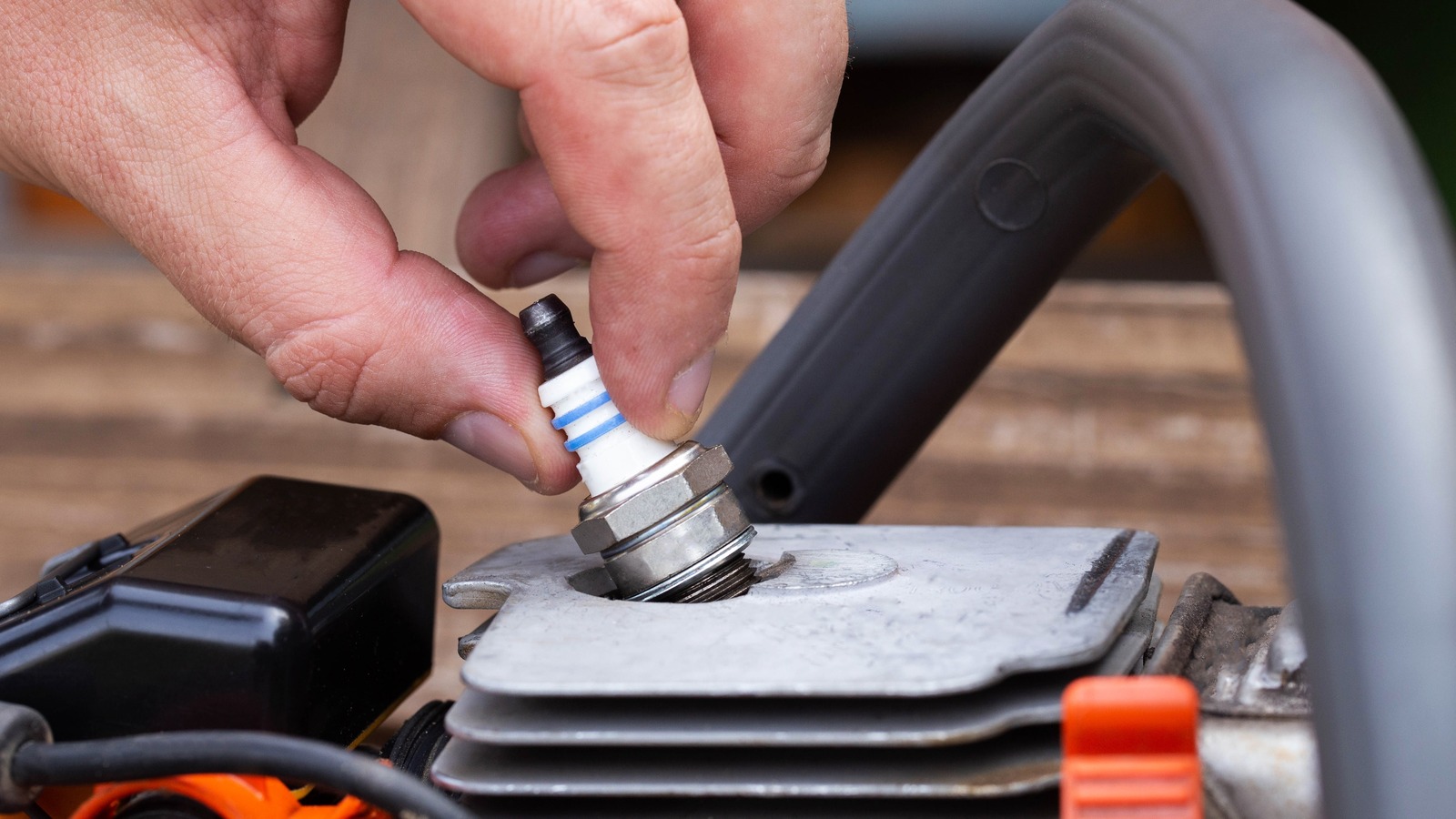 How To Remove A Spark Plug From A Lawnmower