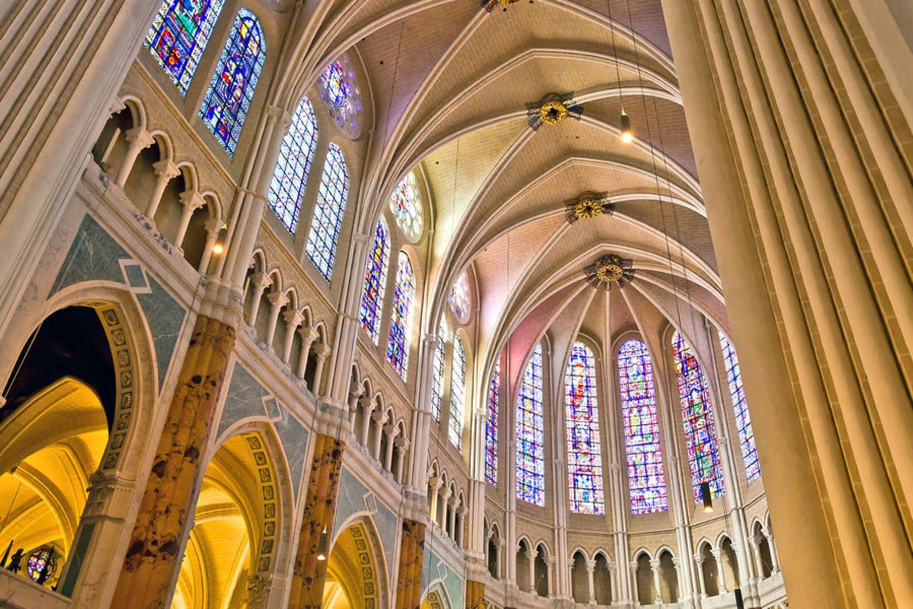 Why Did The Gothic Cathedrals Contain Stained-Glass Programs?