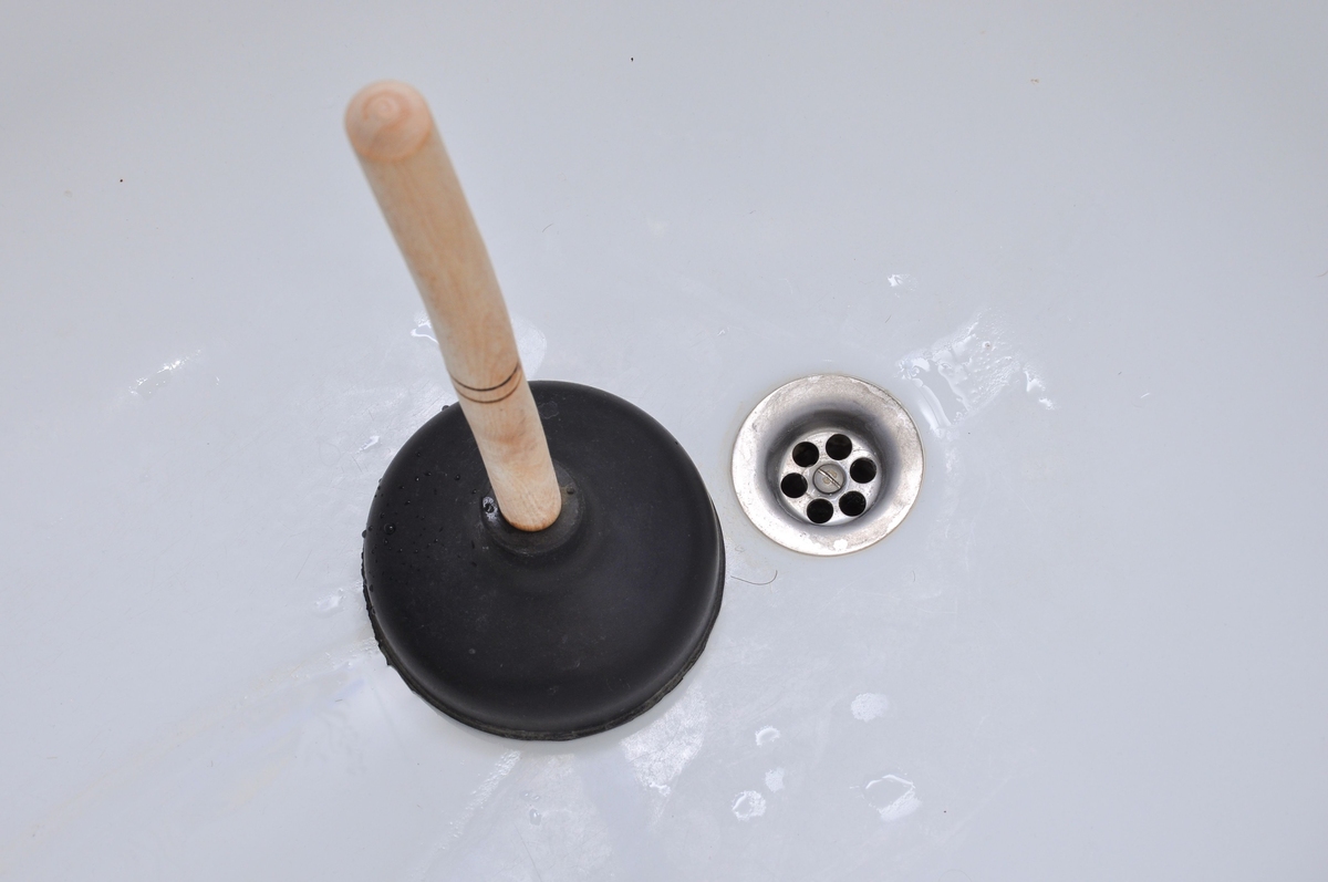 How Do I Retrieve A Detached Plunger From A Bathtub Drain?