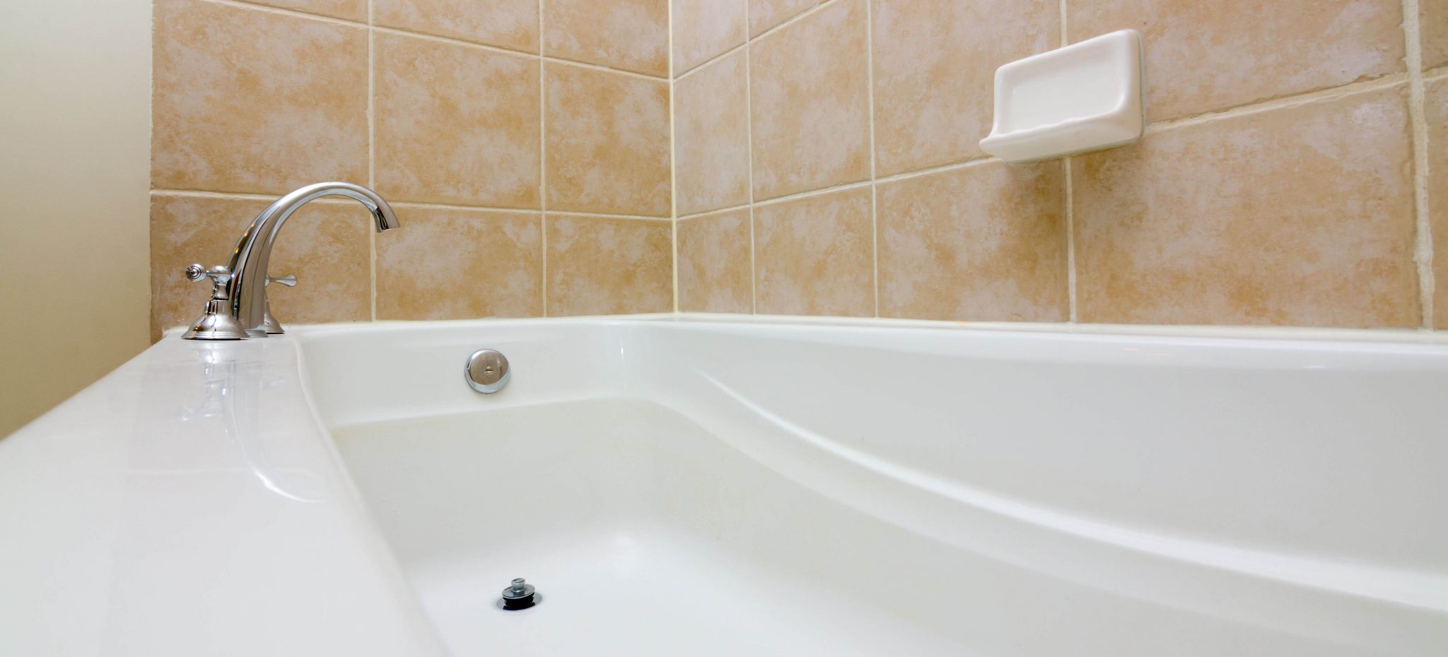 How Far Should A Bathtub Drain Be From The Wall