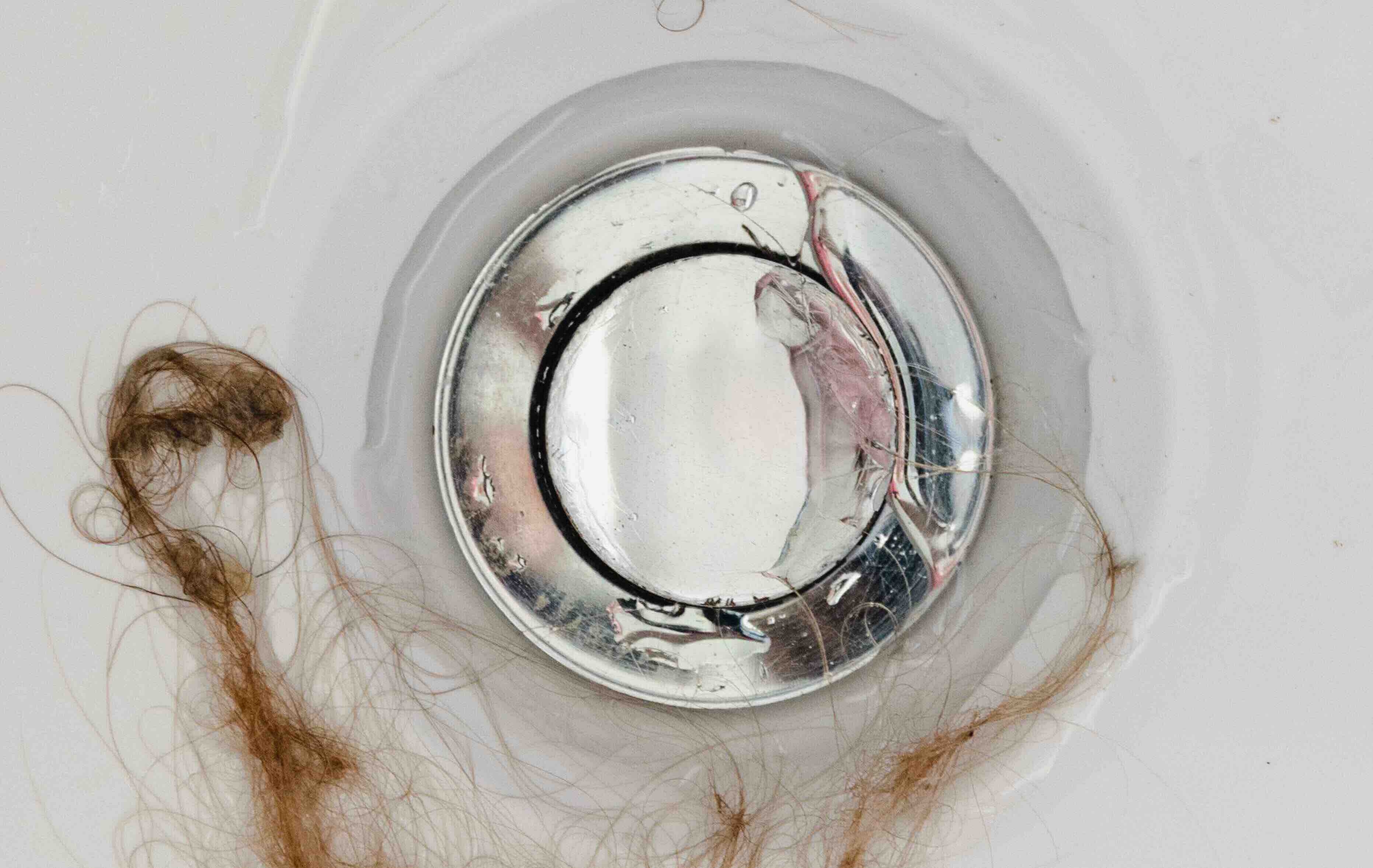 How To Clear A Bathtub Drain Clogged With Hair