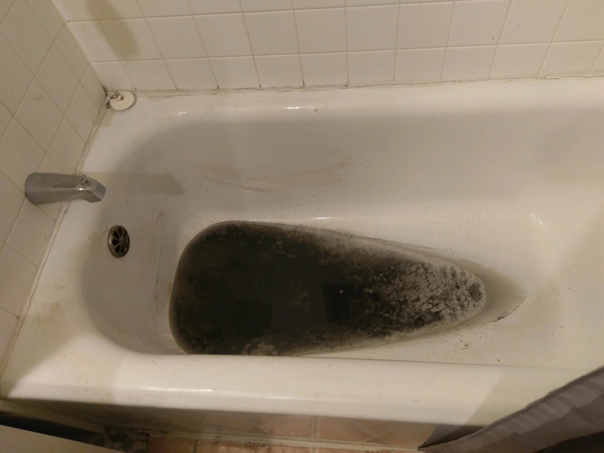 What Is The Black Stuff In My Bathtub