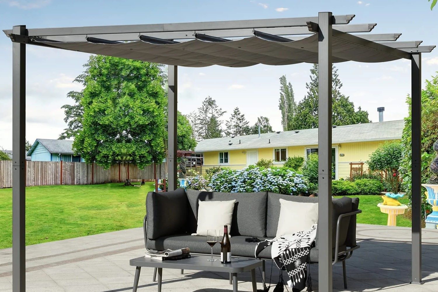 Backyard Pergola with a Retractable Canopy and Adjustable Shade