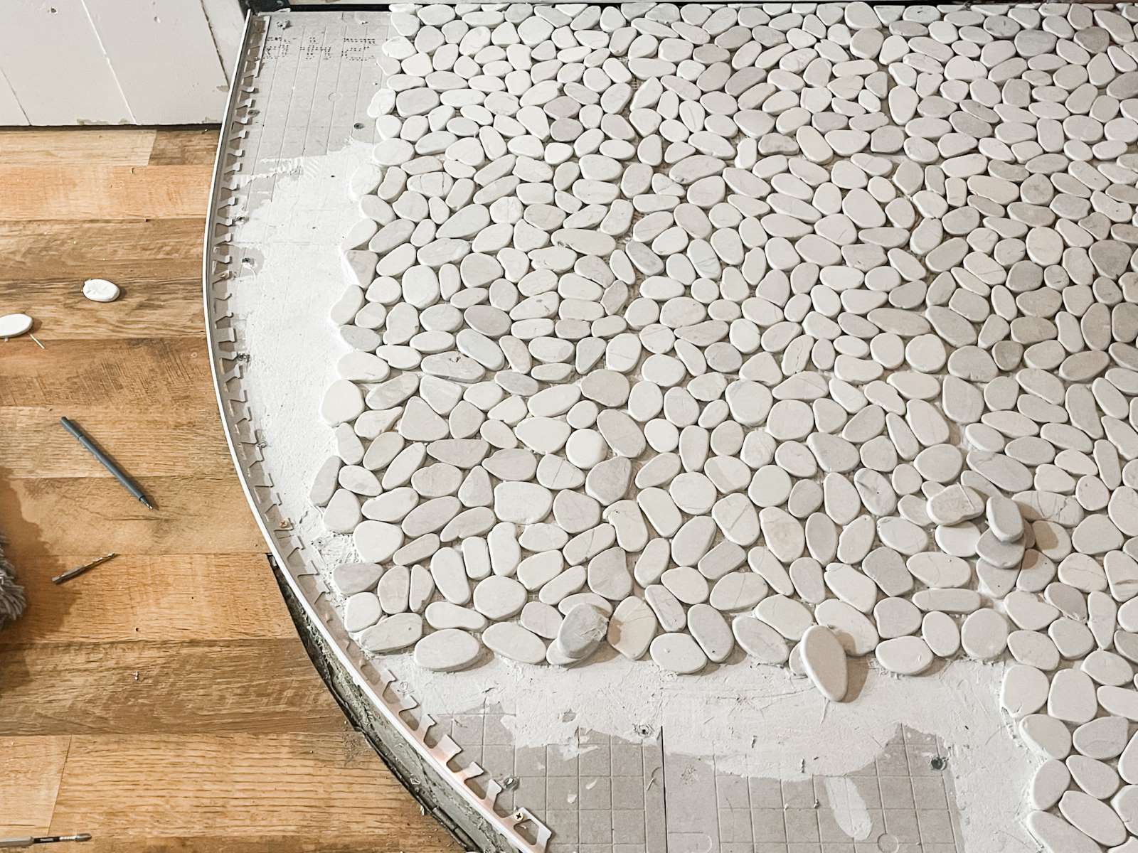 DIY Guide To Installing A Pebble Tile Floor