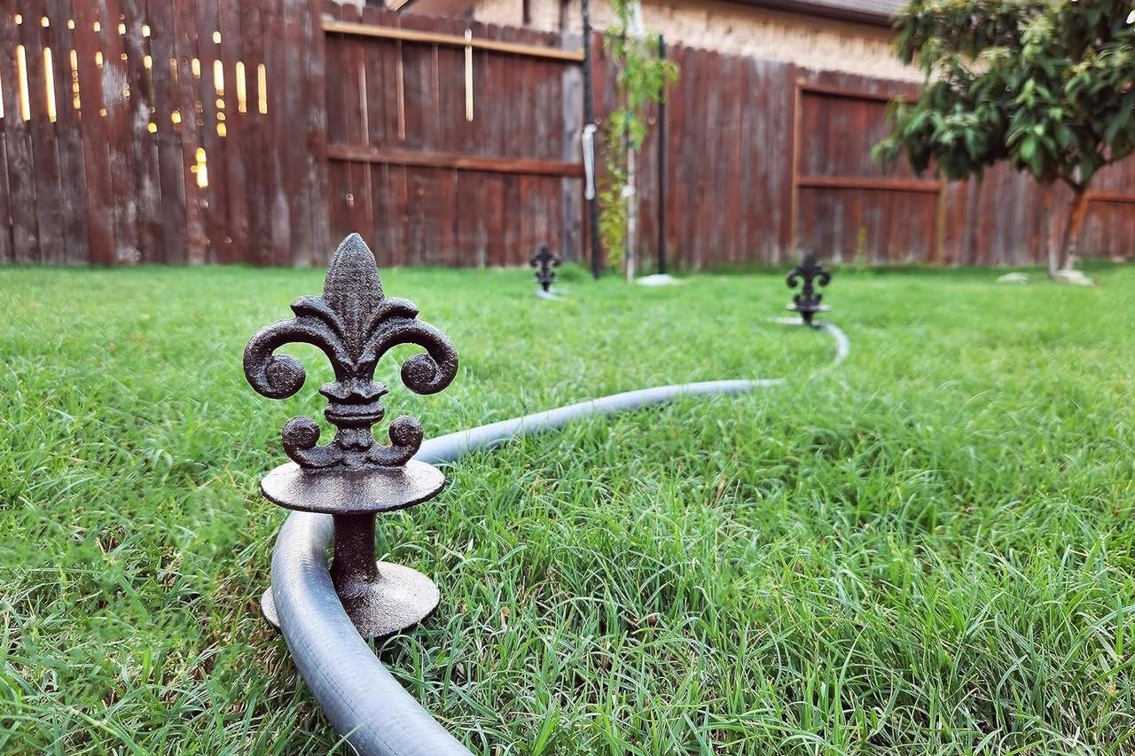 Refreshing Your Garden With Antique Iron Decor